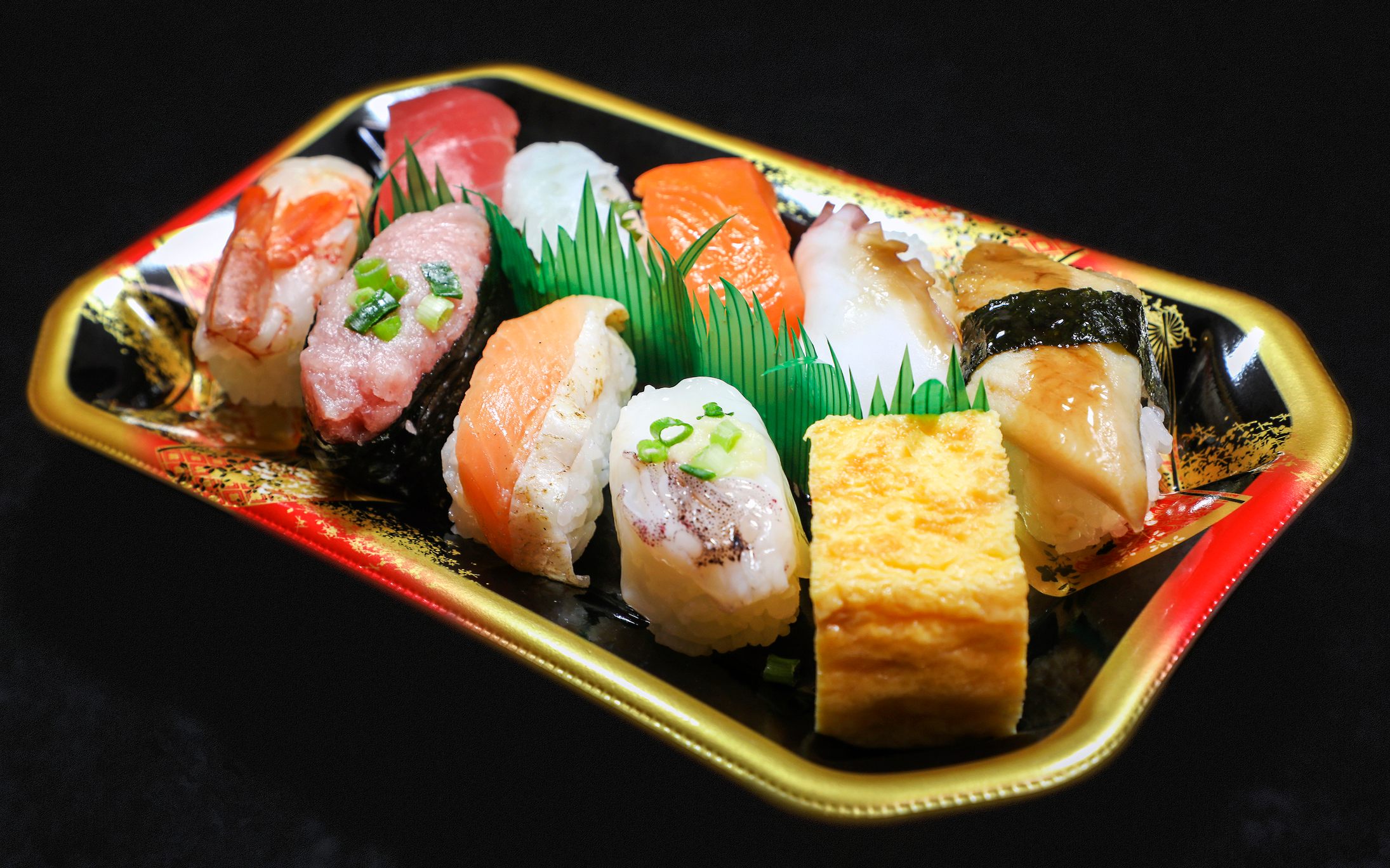 Plastic sushi trays can be extremely elaborate.