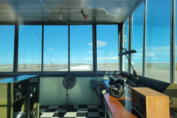 The interior of the Control Tower is still undergoing work. Note the row of hangars in the background in this eastward view.