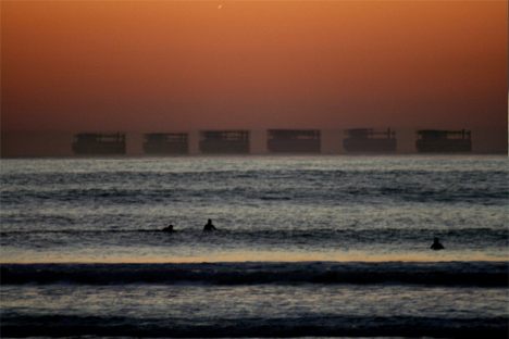 A spectacular fata morgana of a single boat on the horizon. 