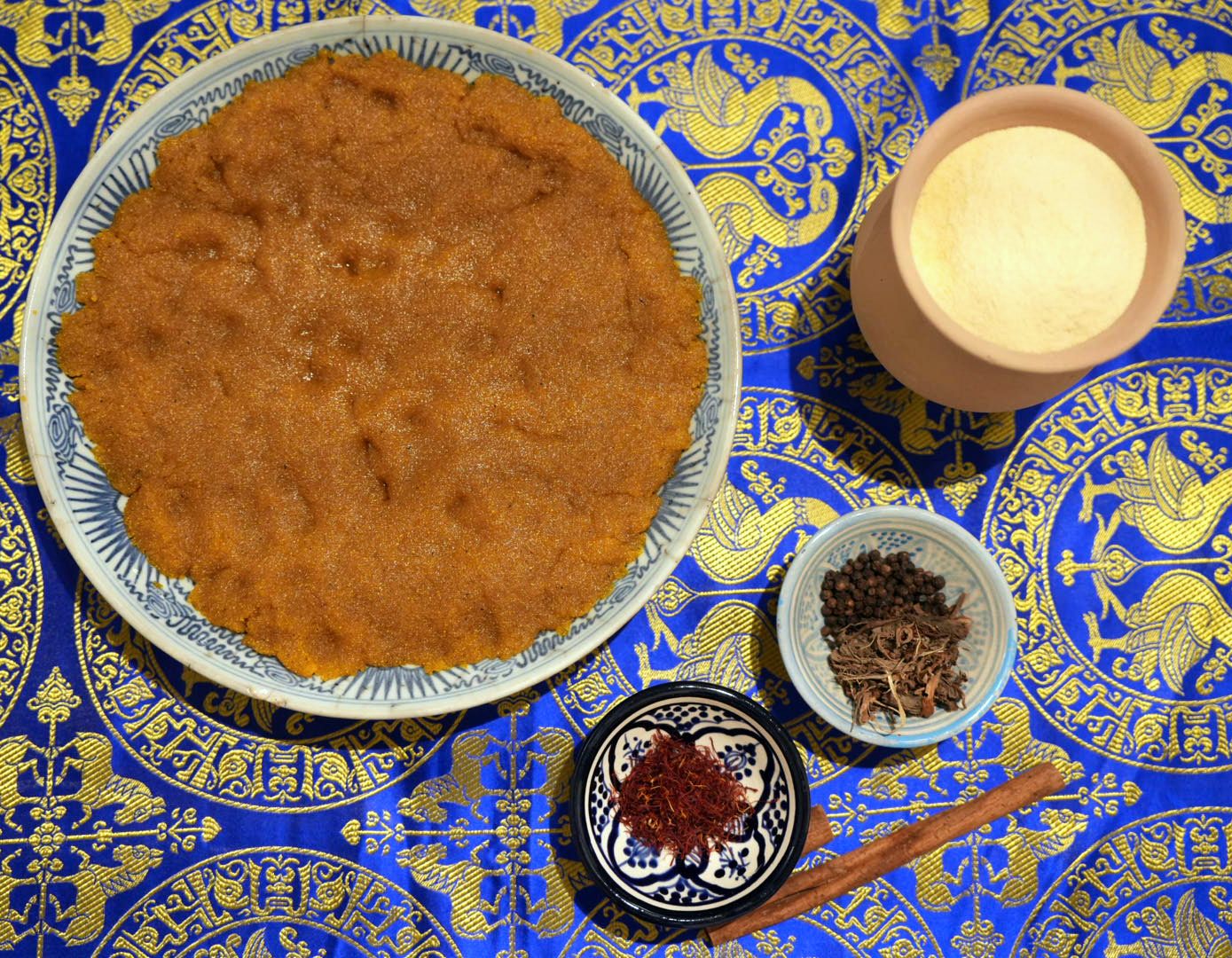 A pudding-like dessert made with semolina and spices called <em>khabis.</em>