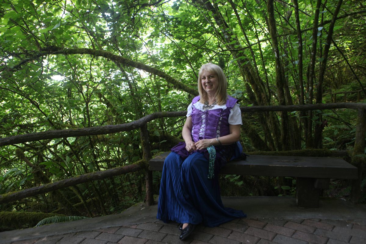 Susan Vaslev, pictured here in costume in 2018, isn't confident that the park will operate as usual next spring.