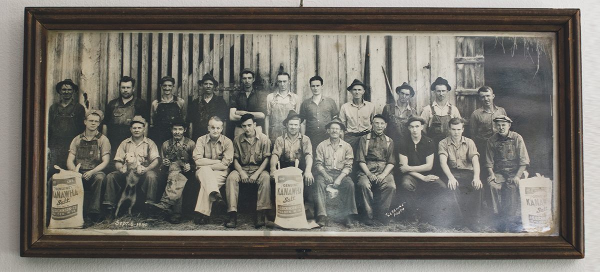 Workers lined up for a photo outside the salt works in 1940.