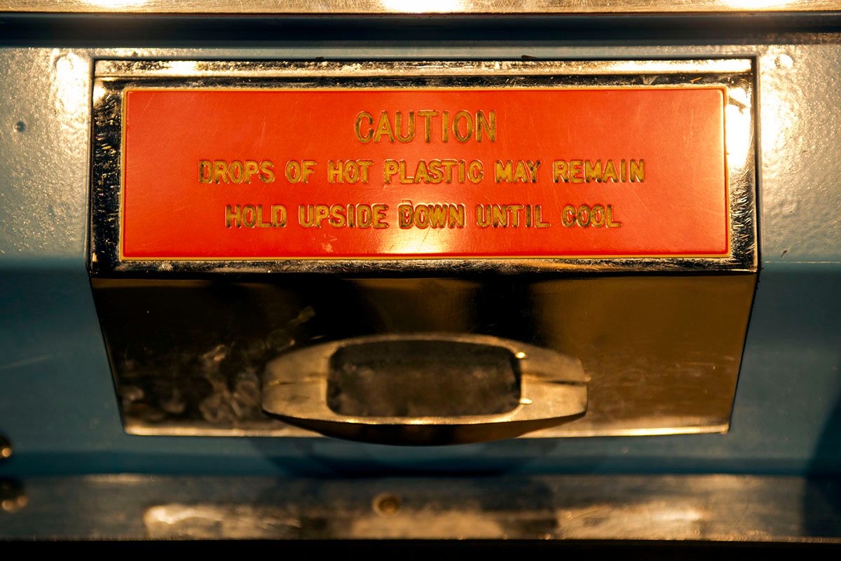 The Mold-A-Rama heats plastic pellets to 250 degrees and
includes a warning that the figurine will come out warm and possibly dripping.