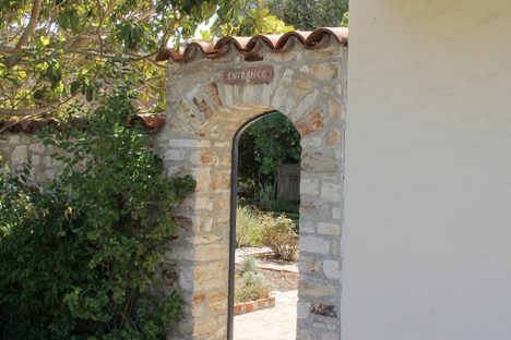 The gate to the patio and garden behind the building