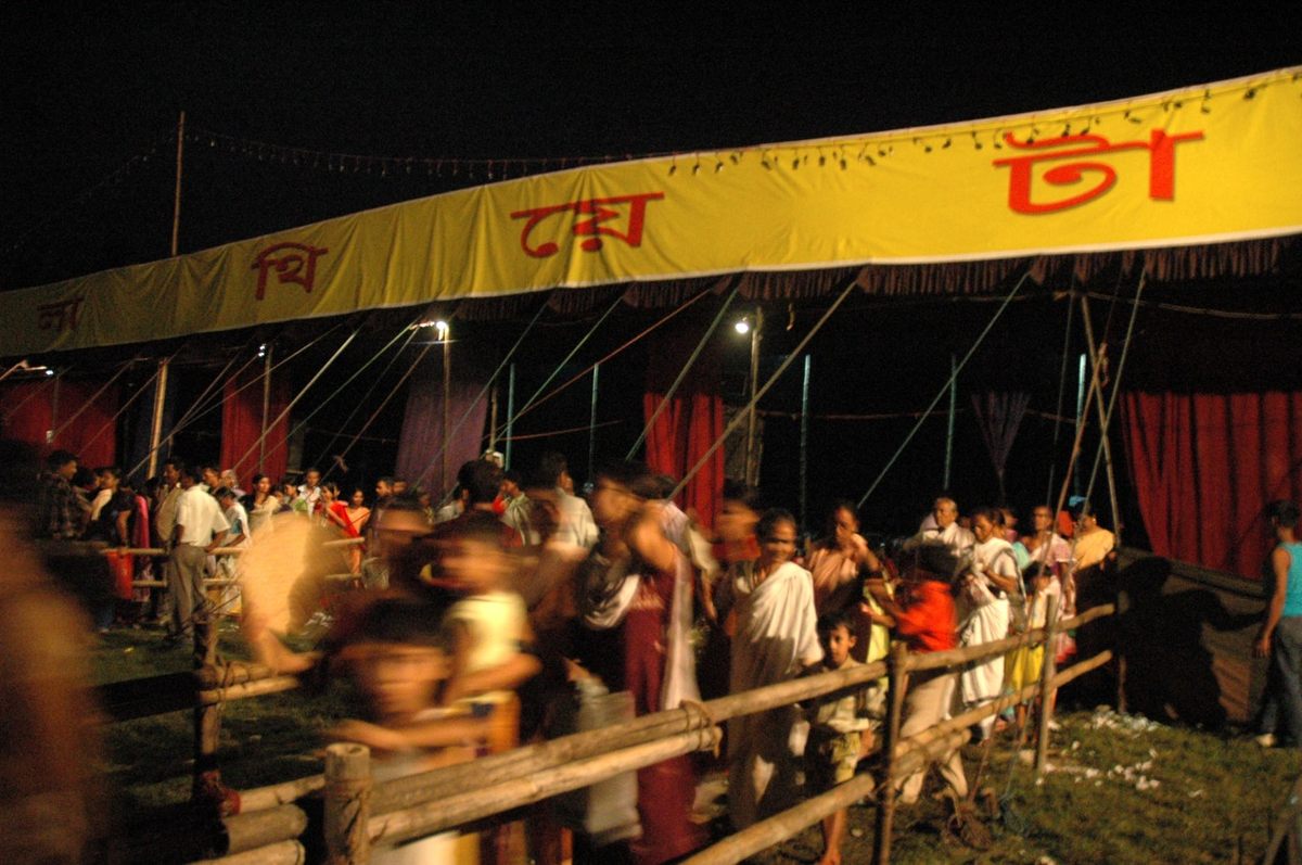Audience departs a mobile theater show in the Nalbari district of Assam.