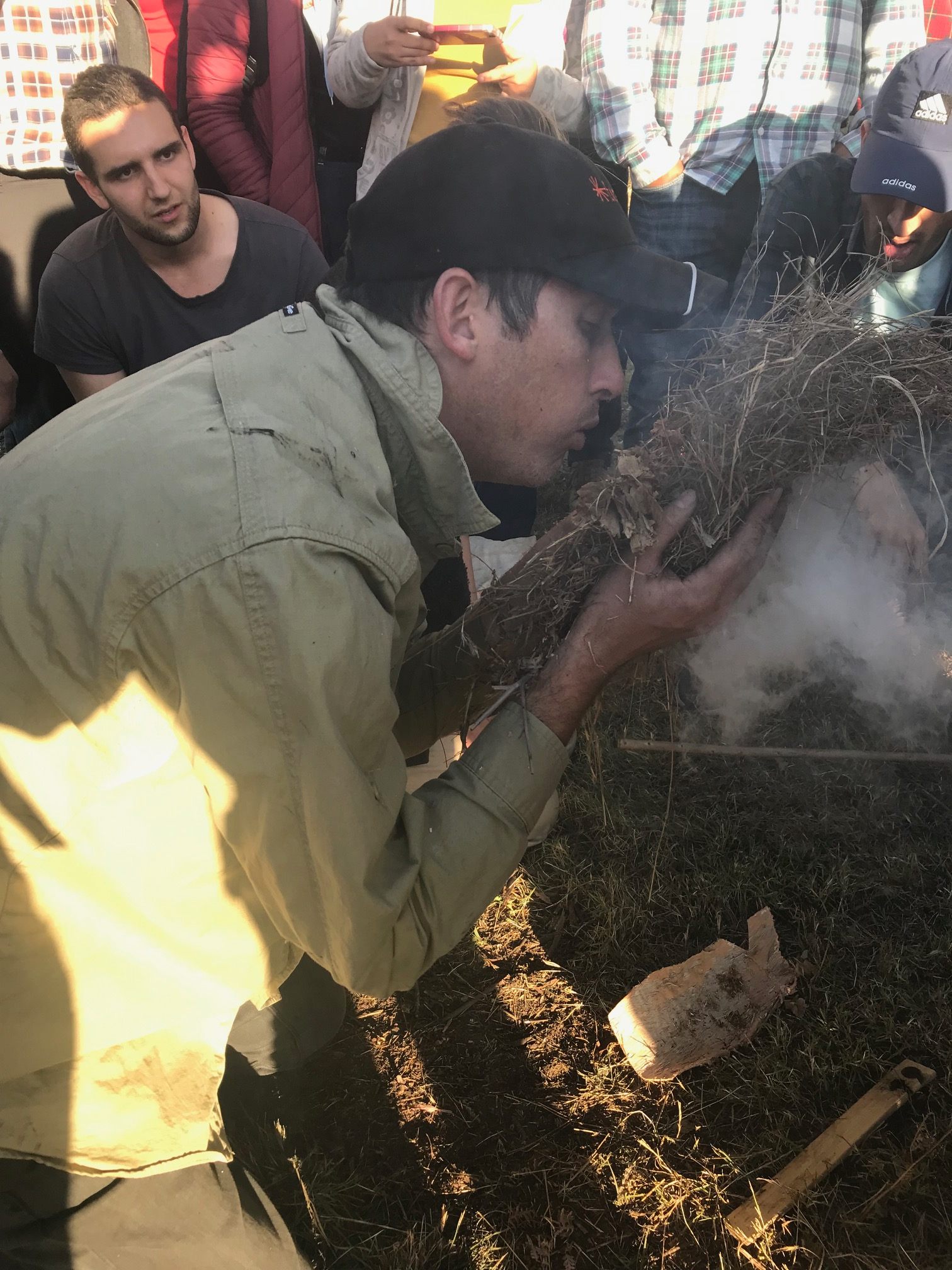 Oliver Costello demontrates fire-starting techniques.