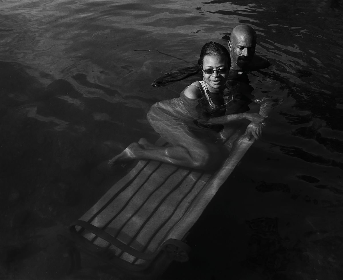 Swimmers on a submerged bench, during the high-water summer of 2010.