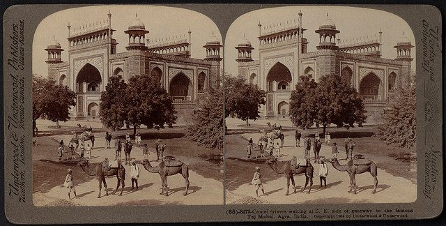 1903. Camel drivers waiting at gate of the Taj Mahal, Agra, India