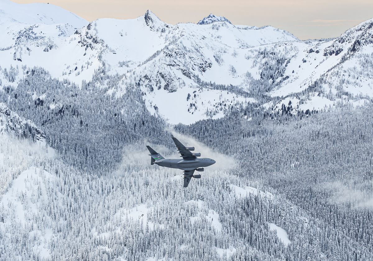 Dave Honan captured this image of a C-17 Globemaster III transport jet in the Cascade Mountains of Washington State. 