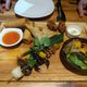 The Bugs Cafe's Discovery Platter: Two wild spring rolls, one insect skewer, one Mediterranean Feuilletés with ants, one tarantula doughnut, one Tarantula Samosa, one crickets-and-silkworm salad.