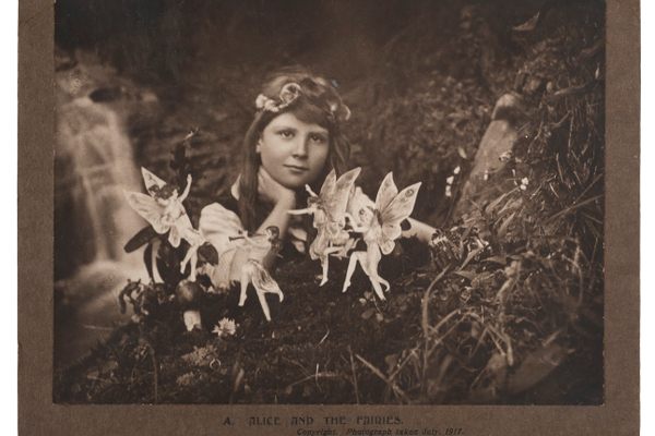Elsie Wright photographed her cousin, Frances Griffths, surrounded by fairies in July 1917.