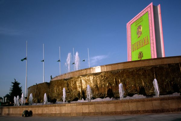 Fountain and giant Ruhnama at Independence Park in Ashgabat.