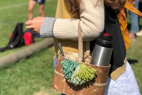 A matera with the owner's thermos and bombilla sticking out the top.