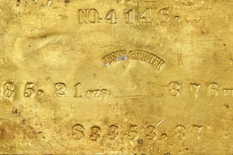 A gold ingot from the SS Central America, weighing 185.21 ounces.
