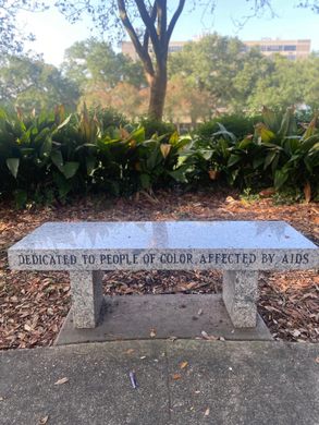 A granite bench in a park