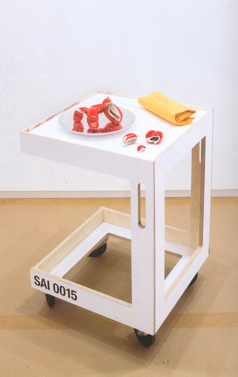 Jeff Koons's <em>Red Balloon Dog</em> was "shattered in fall."
