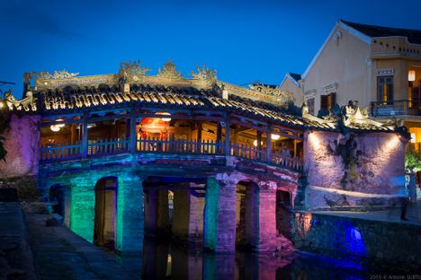 The bridge illuminated at night.
