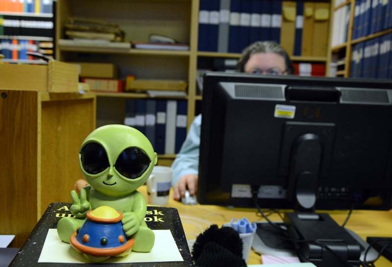 A little green alien on Tobias Lindgren’s desk at the Archives for the Unexplained. 