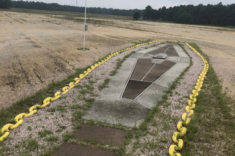 The memorial is a tiny (very easy to miss) spot I’m the middle of a massive field. You can visit it (provided you already have base access) without seeing the museum. 