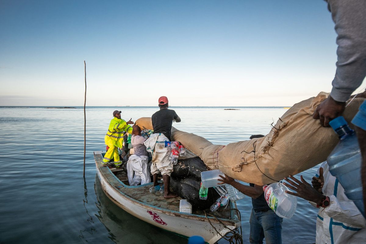 Fishermen and other volunteers with boats deployed handmade booms around Mahebourg's lagoon and other affected areas, removing 75 percent of the spilled oil by mid-September.