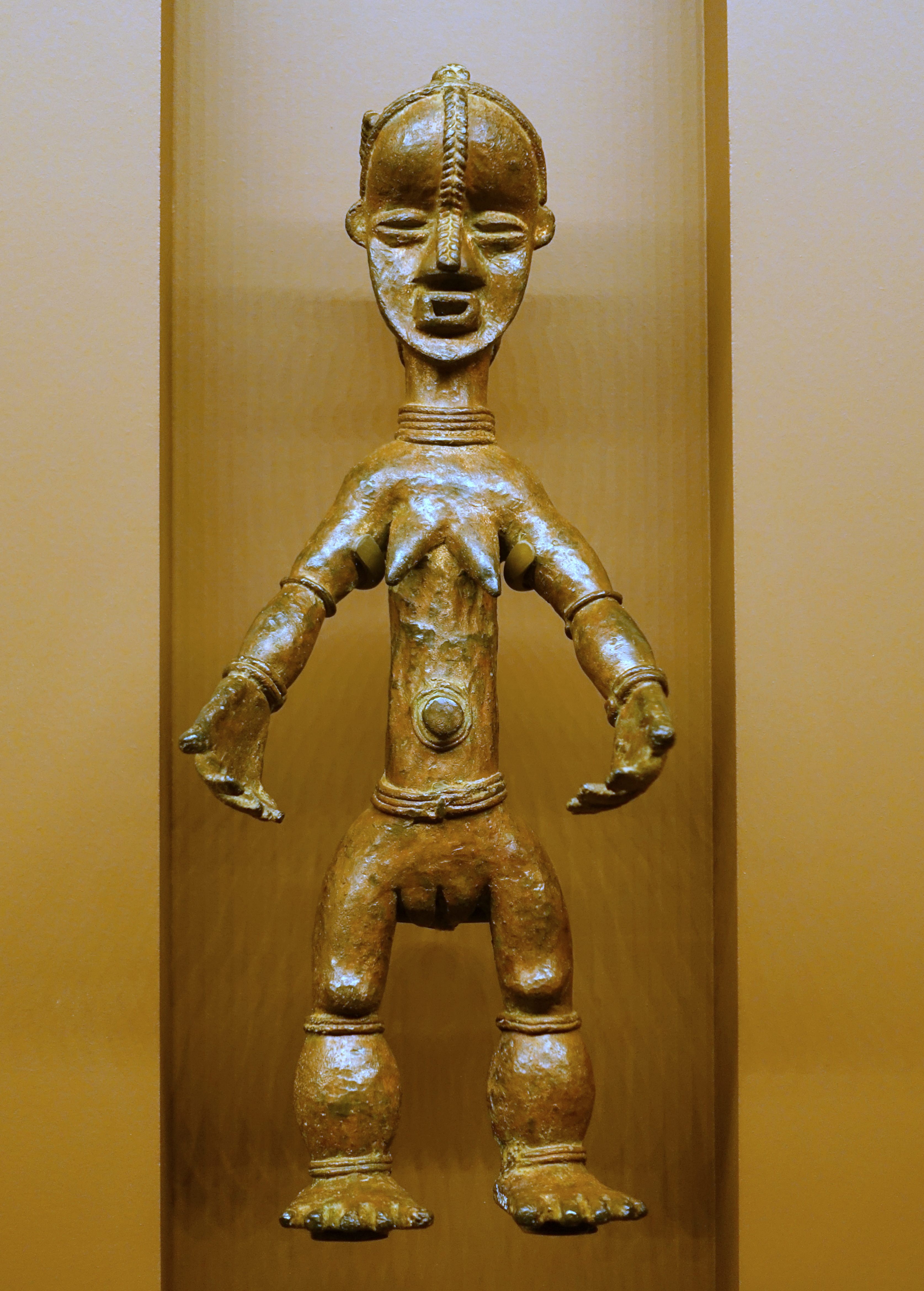 This standing female figure is made of brass and on display in the in the National Museum of Natural History in Washington, D.C.. It is believed to date to the 1920s.