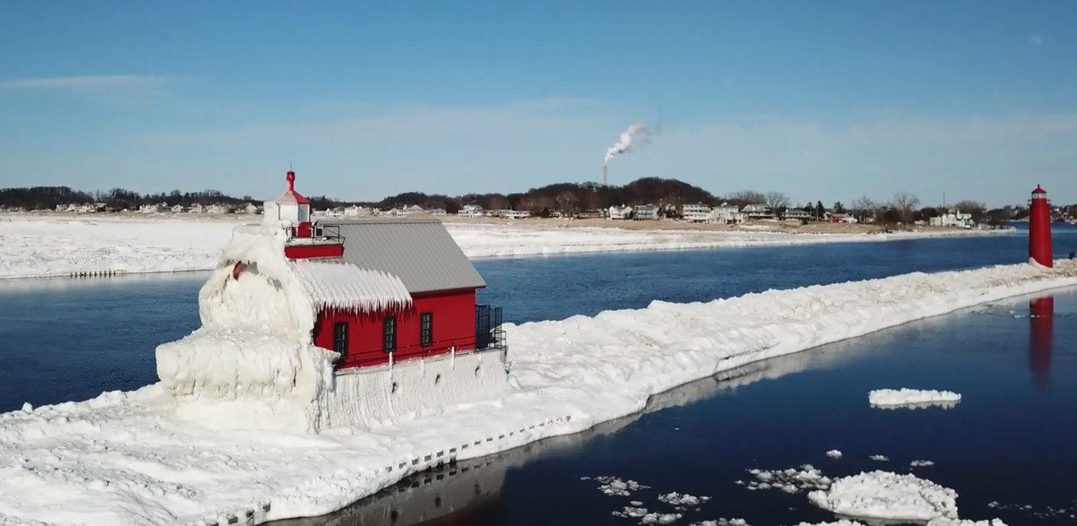 The outer lighthouse on this pier in Grand Haven, Michigan, is often spattered with ice.