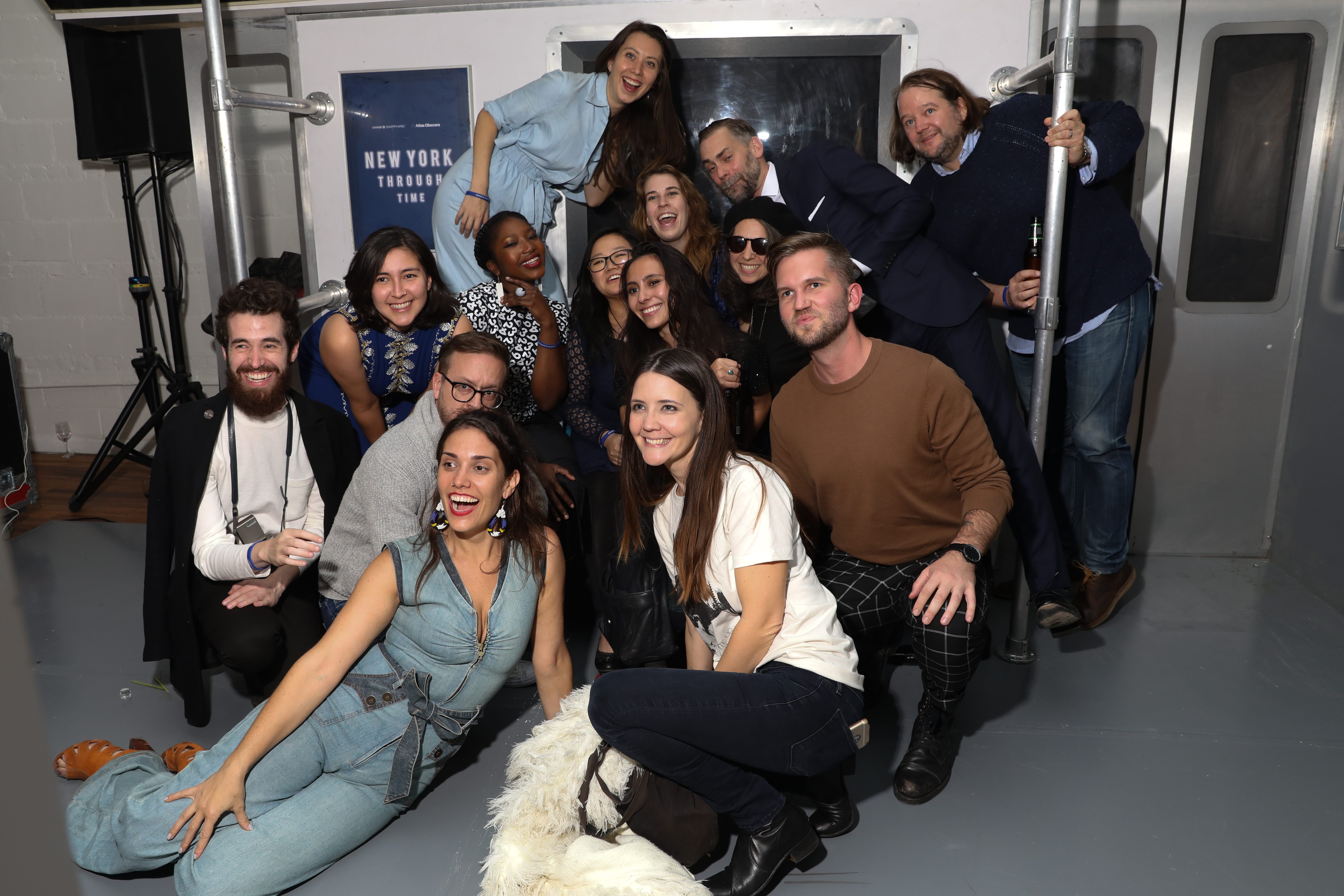 A group shot at the subway-themed photo booth.