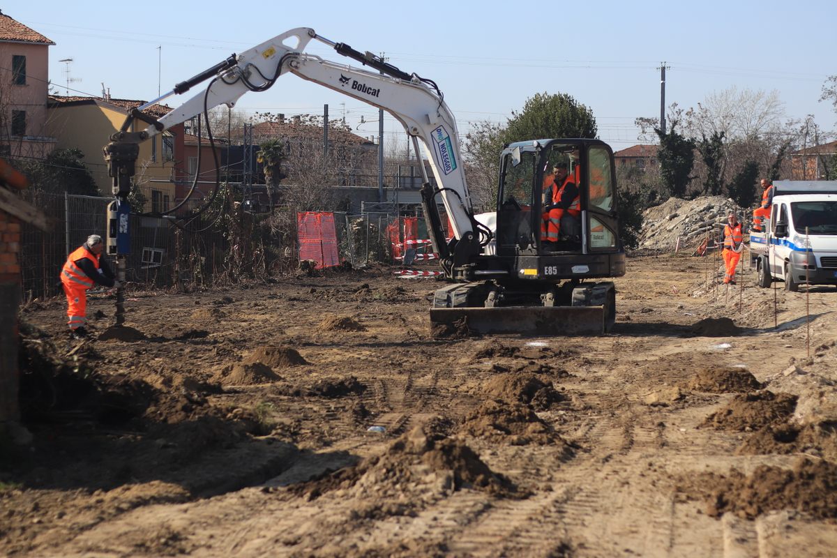 After clearing the surface with metal detectors, the CEA Demining team uses an excavator to insert probes that can sense deeper metal deposits.