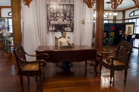 A wax likeness of Marcos at his desk in Batac