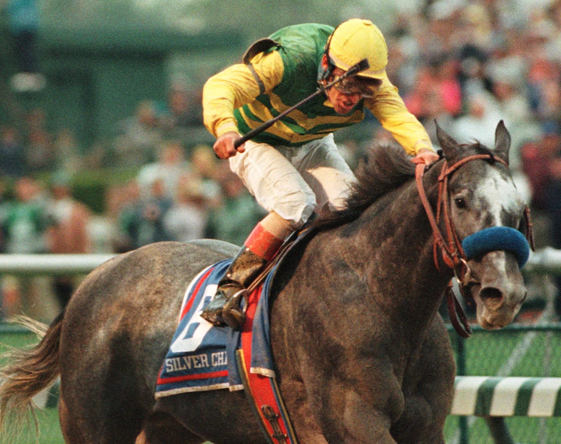 Silver Charm and jockey Gary Steven crossed the finish line first in the 1997 Kentucky Derby.