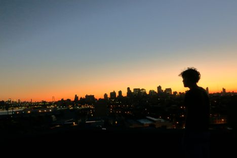Hendrik watches the sun rise over the city that never sleeps