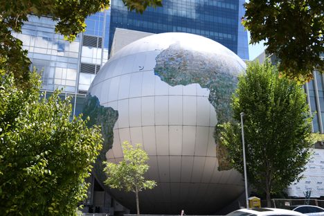 A view of the Daily Planet Theater from W Jones St.