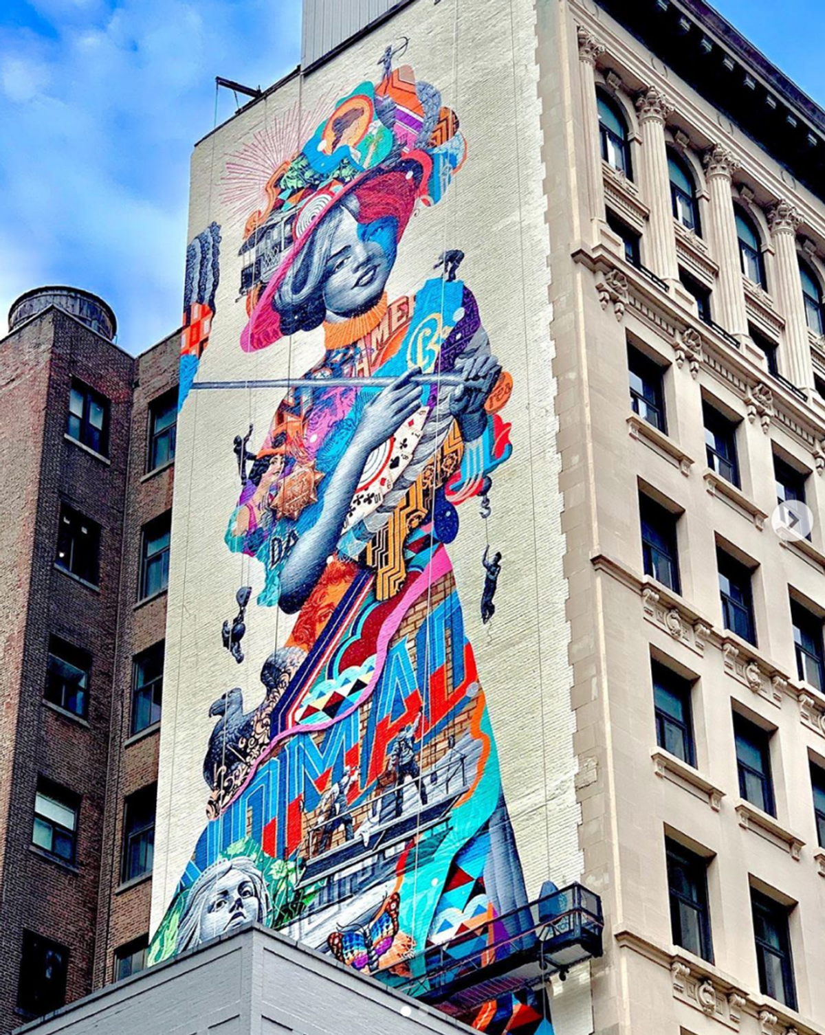 Honorable mention: Catherine S. Dragonfly's photograph of a street mural in New York City.