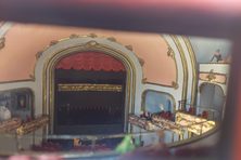The miniature theatre’s 200-seat capacity is slowly being filled with tiny figurines of beloved film characters, from classic movie stars to Muppets. Statler and Waldorf are perched in their usual spot at the front-right balcony. There’s even an ongoing call for visitors and locals to add their own favorite characters to the growing crowd.