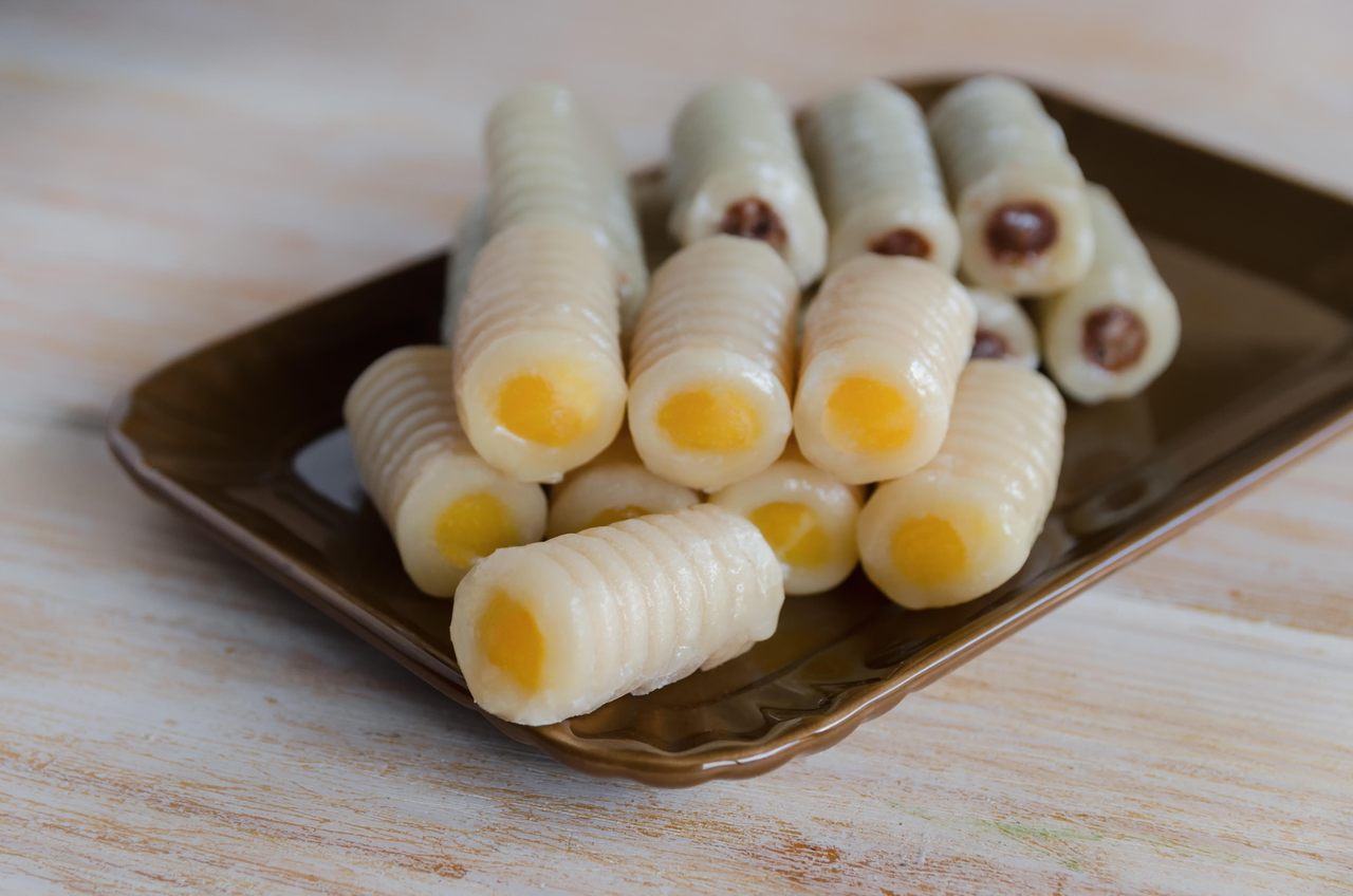 The little marzipan bones are traditionally filled with egg-yolk marrow.