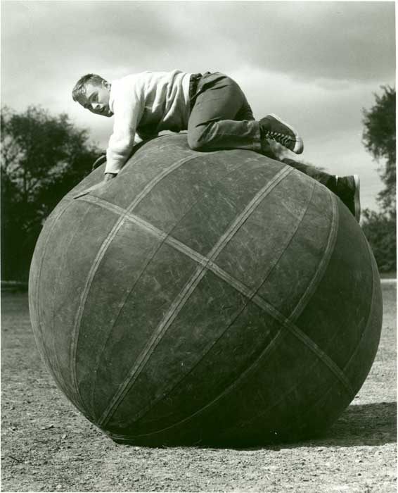 A player messes around at Washington & Jefferson's annual pushball game in 1957.