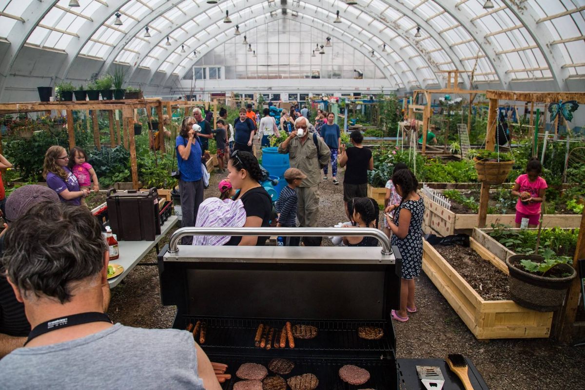 The greenhouse provides fresh produce, flowers, and even a space for the occasional barbecue.