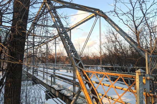 Porter’s Island bridge, built in 1894, showcasing the original lattice railing.