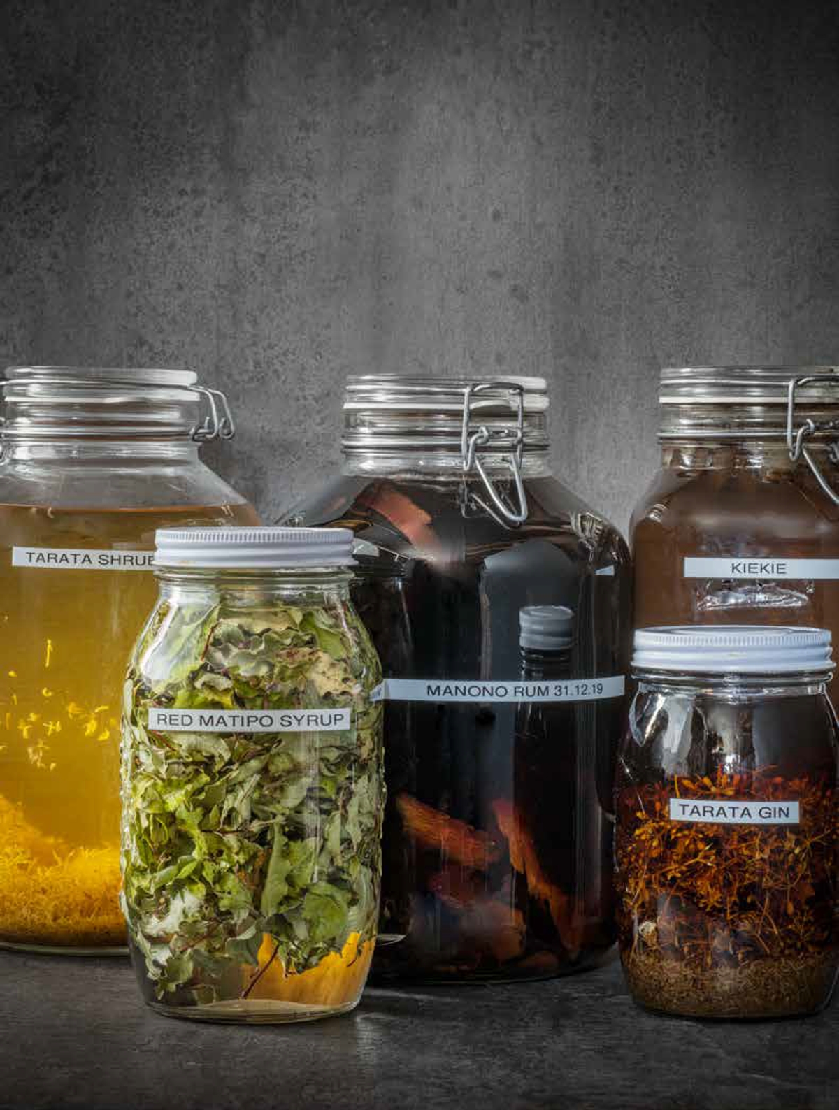 Native herbs, preserved in liquor and syrup.