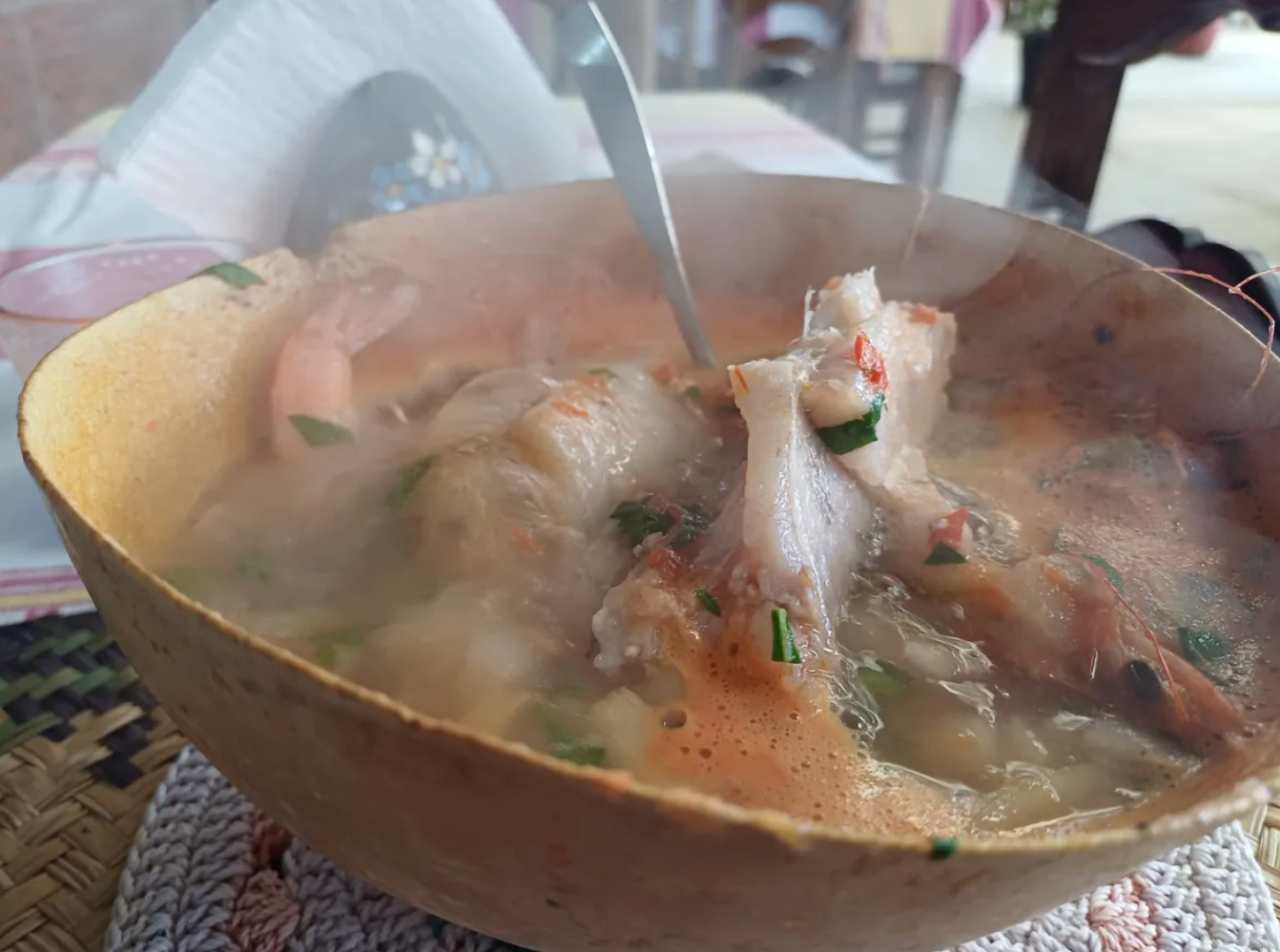 The soup bubbles away for several minutes after the hot stone is added to the pot. 