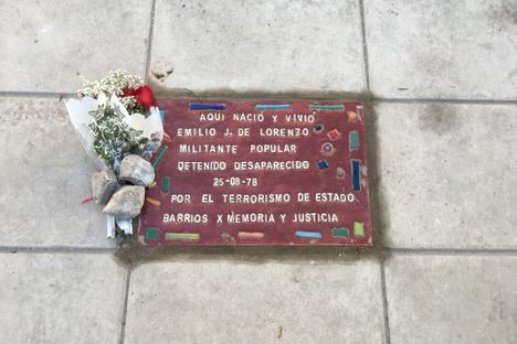 The memorial tile for Emilio de Lorenzo. 