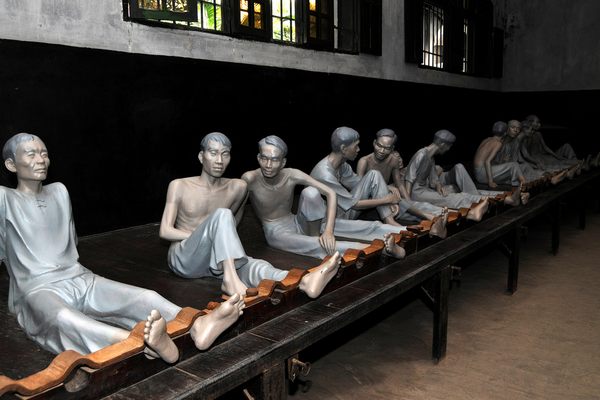 Mannequin prisoners shackled in the French Colonial section of Hỏa Lò Prison.