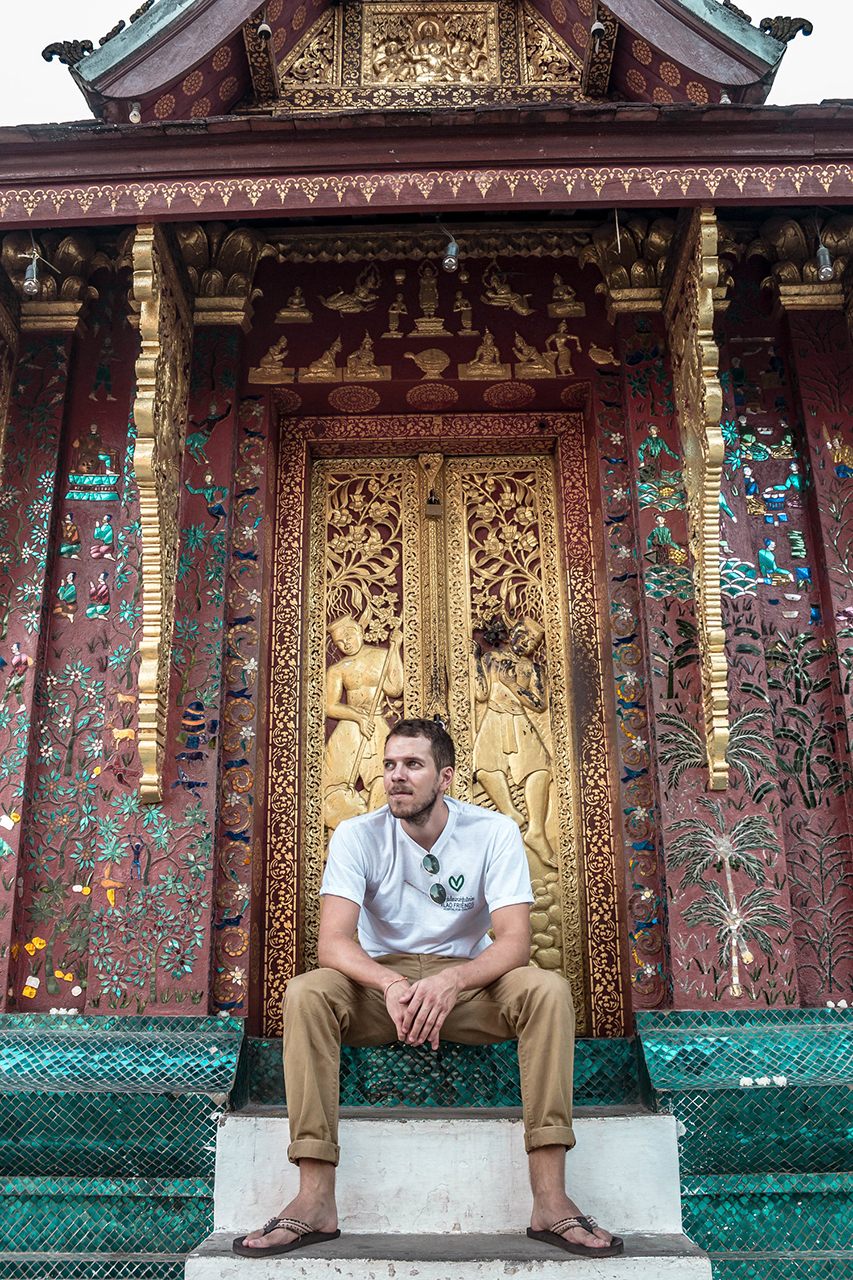 Luke Tavener, the founder of Orange Robe Tours, runs the business out of a small storefront on a dusty road in Luang Prabang.