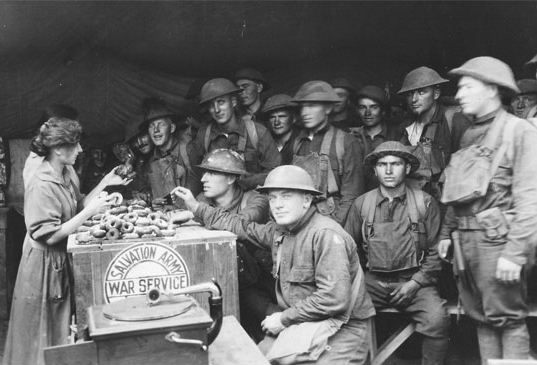 Salvation Army "doughnut girls," frying up treats for the troops in 1920.