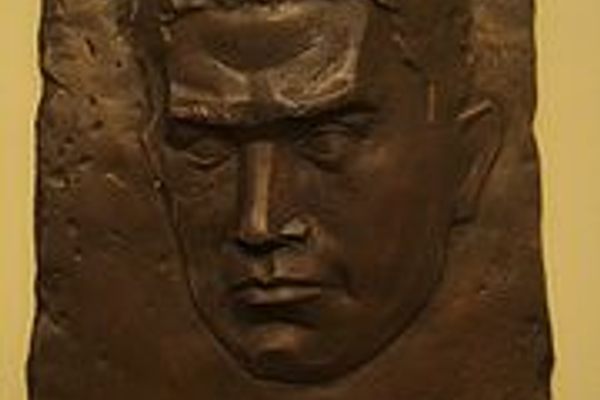 A bronze relief of Juozas Luksa-Daumantas, Lithuanian partisan. 