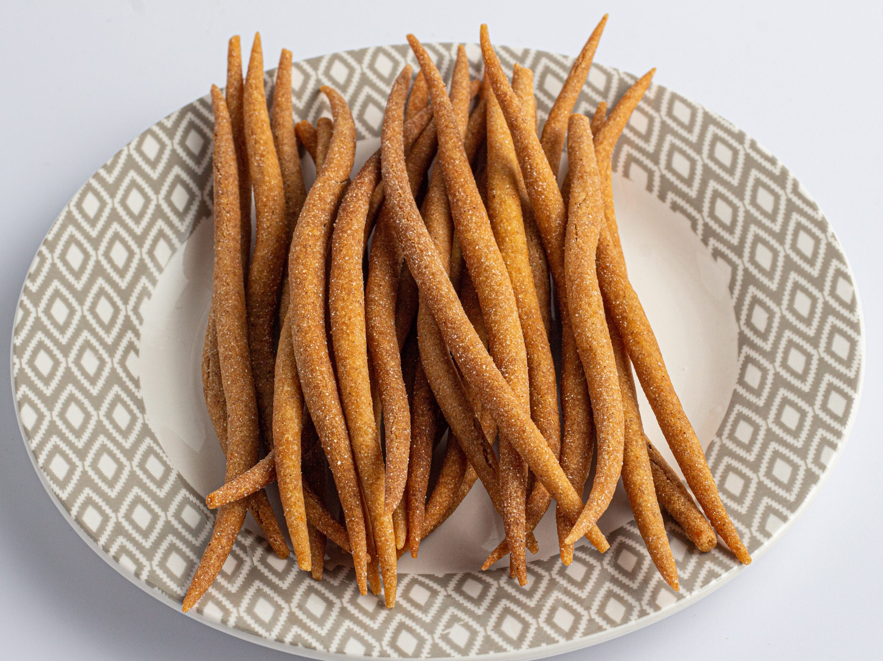 Be sure to snag some Lagos Island snacks, like the savory cornmeal sticks known as kokoro.