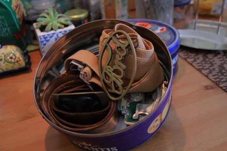 Belts on belts in this cookie tin. 