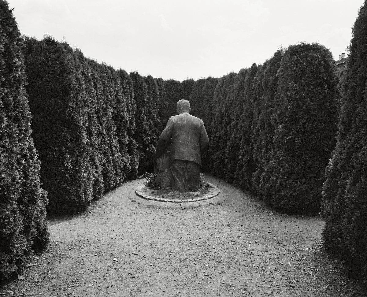 <em>Discarded Monument at the Center of a Labyrinth, Czechia</em> (2018): “My wife, who is Czech, was spending a weekend with her girlfriends at a cottage in the Czech countryside—basically in the middle of nowhere—when a friend told her about a nearby labyrinth with a statue of Stalin. There was no town, just a chateau that had been repossessed by the communist government, and then returned to the owners’ family after the Velvet Revolution. The new owners discovered this statue in the basement. Apparently it had been commissioned just before the regime change and never erected. The owners decided to make a tourist destination of this labyrinth in order to generate restoration funds. My wife and kids came with me the day I shot this photo. When we bought our tickets, the lady at the ticket booth said to my daughters, ‘Be careful, at the center of the labyrinth is a monster!’”