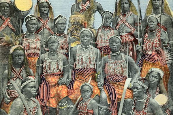 The real women warriors of the Dahomey Kingdom, photographed here in 1897, have been the subject of many fictional tales, including the upcoming film The Woman King, starring Viola Davis.