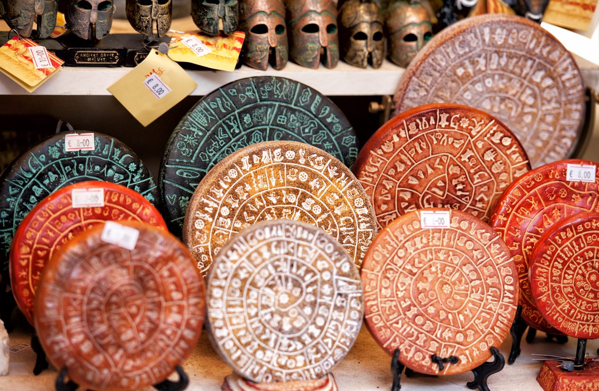 Souvenir replicas of the Phaistos Disc, which has become a symbol of Greece—even though it's not Greek.